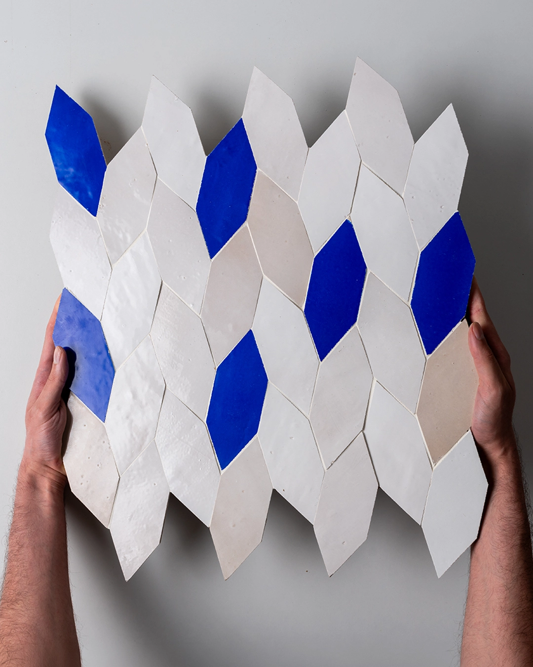 Hexagon shaped zellige tiles in white and blue copy
